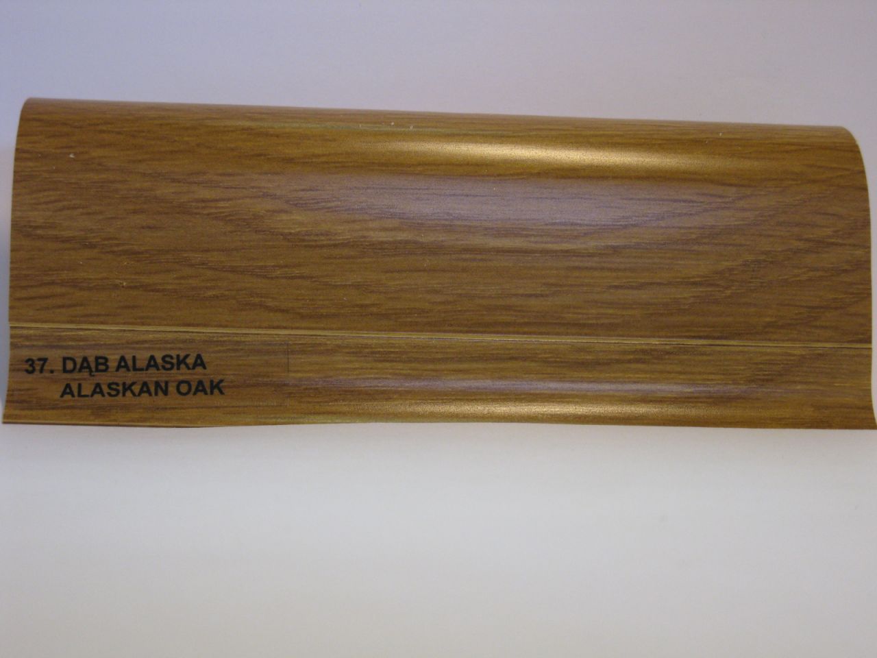SALAG NG szegélyléc, alaszkai tölgy, gumis szegéllyel NGF 56mm, hossz: 2,50m